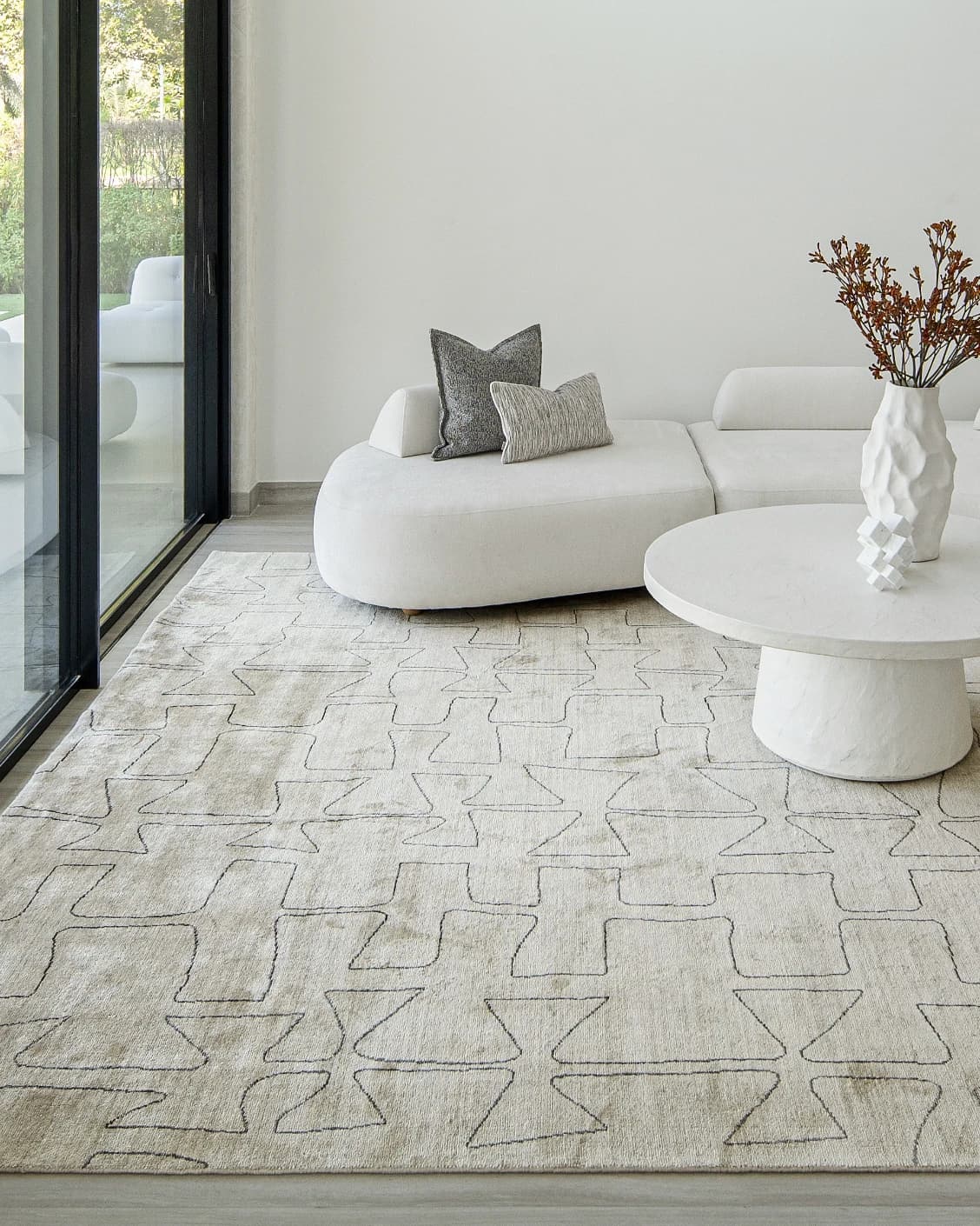 Caleb Ebony carpet in ebony, pearl and grey, shown in a lifestyle front view as image 9