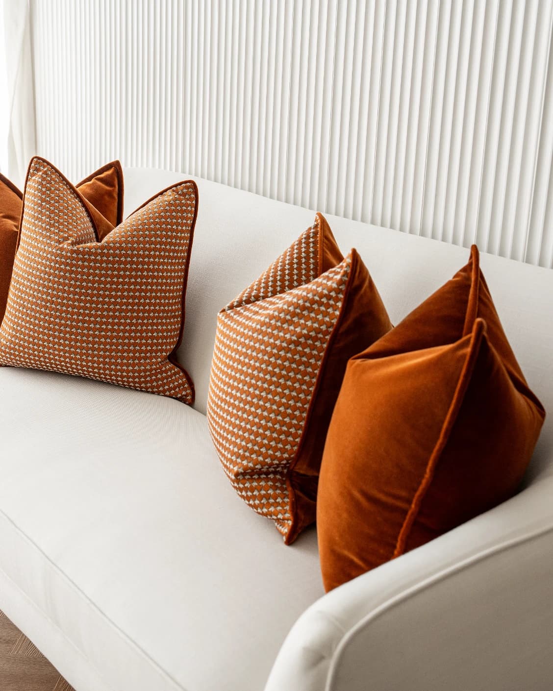 Callan Bundle cushion in rust and orange, shown in a product front view as image 6