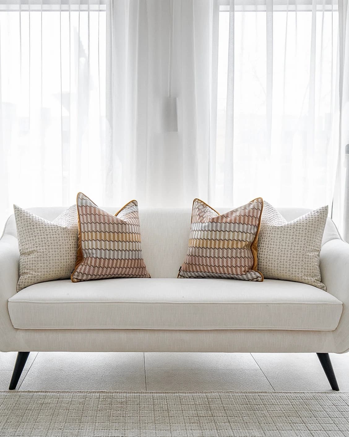 Camella Bundle bundle - indoor in orange, yellow, silver and white, shown in a lifestyle front view as image 1