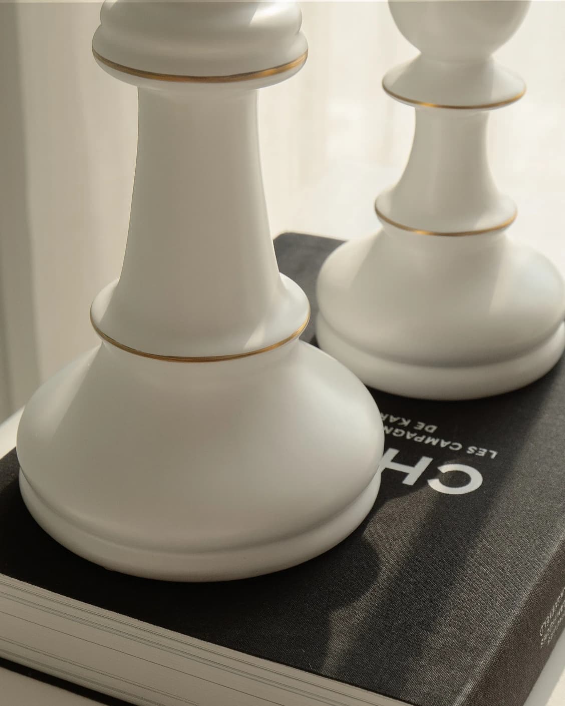 Cassandra Arneson Porcelain Figures statues and sculptures in white and gold, shown in a lifestyle close-up as image 4