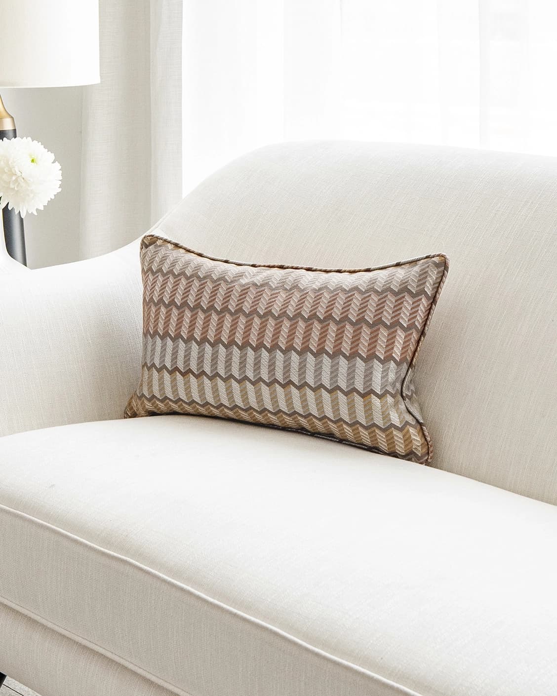 Cecilia Hodler II cushion in orange, yellow and multicolour, shown in a lifestyle right view as image 2