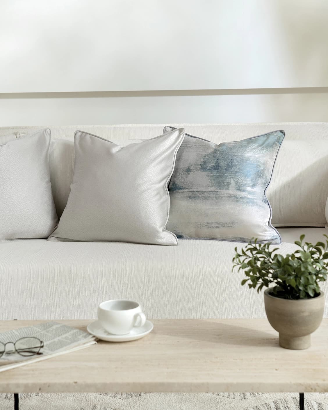celia-bundle-blue-silver-lifestyle-left-view-cushion-id-dsc02875.webp