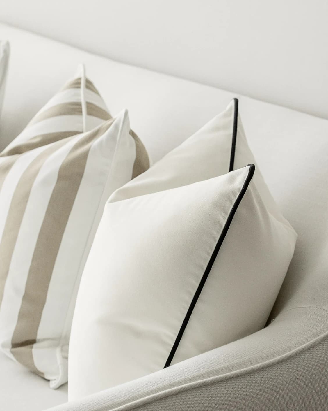 Cente Bundle cushion in brown, beige and silver, shown in a product front view as image 6