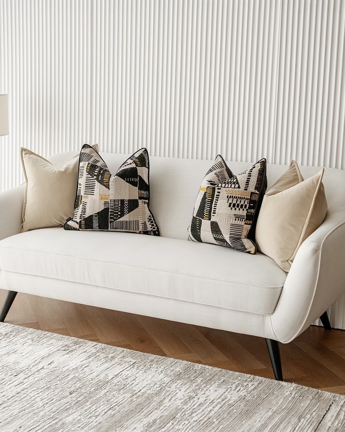 Charna Bundle cushion in beige, shown in a lifestyle right view as image 2