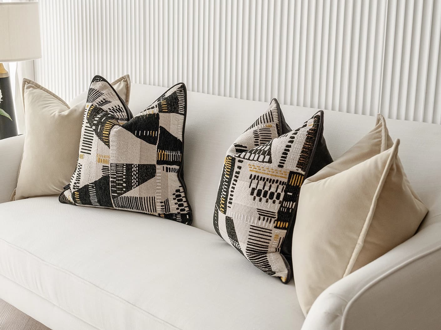 Charna Bundle bundle cushions in beige, shown in a lifestyle front view