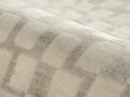 Chess Dune carpet in dune, taupe and beige, shown in a lifestyle close-up front view
