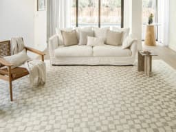 Chess Dune carpet in dune, taupe and beige, shown in a lifestyle close-up front view