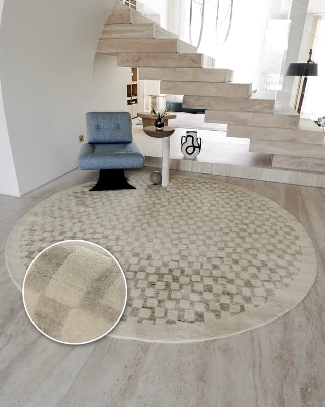 Chess Dune Round carpet in dune, taupe and beige, shown in a lifestyle front view as image 2