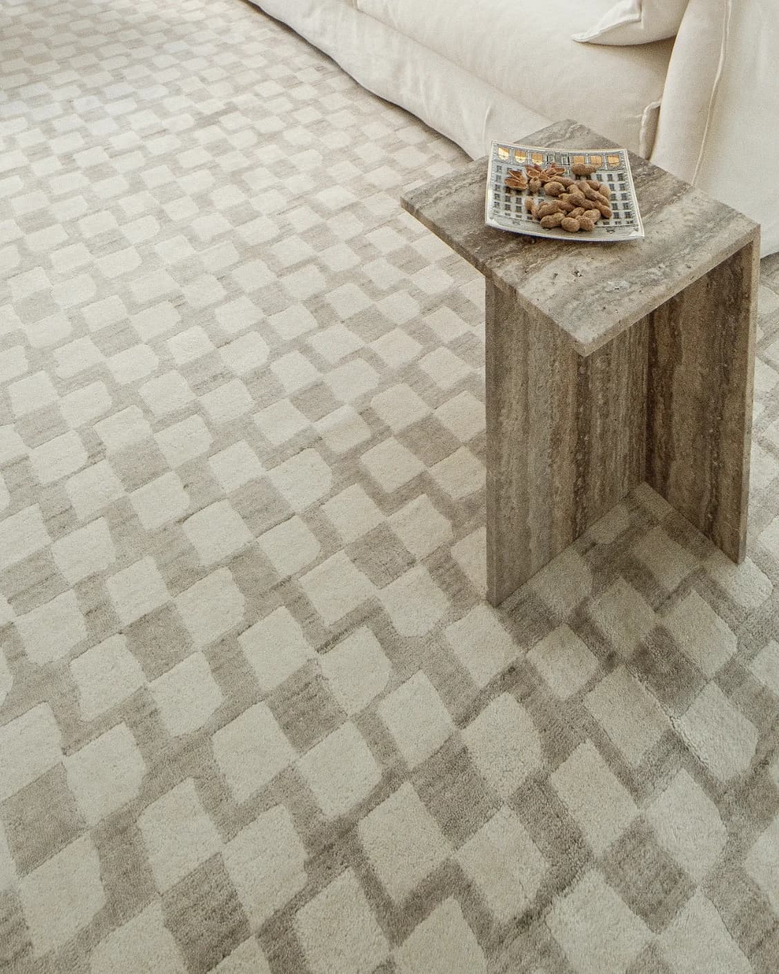 Chess Dune carpet in taupe and beige, shown in a lifestyle close-up as image 5