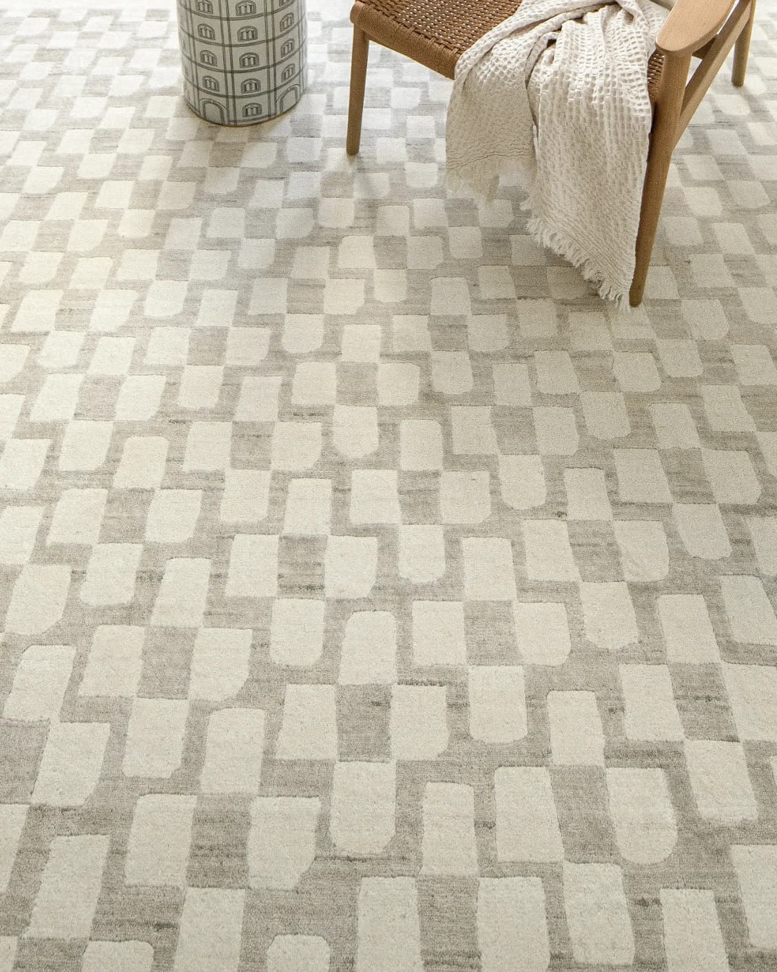 Chess Dune carpet in taupe and beige, shown in a lifestyle close-up top view as image 8