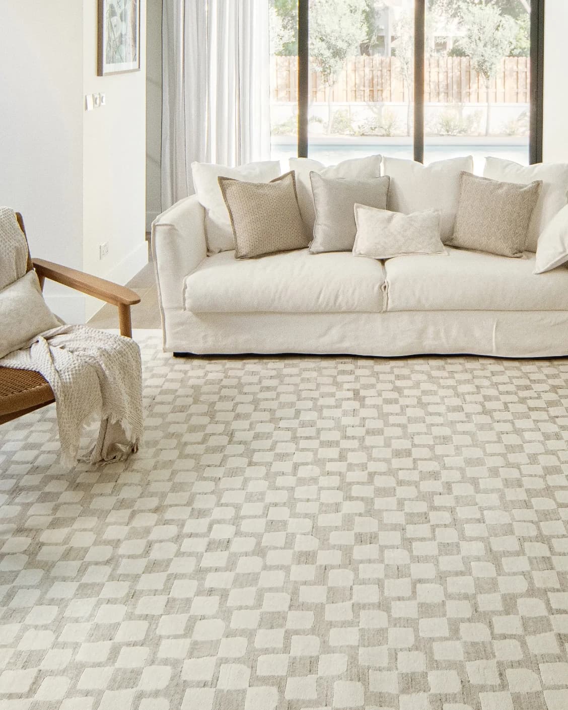 Chess Dune carpet in taupe and beige, shown in a lifestyle front view as image 9