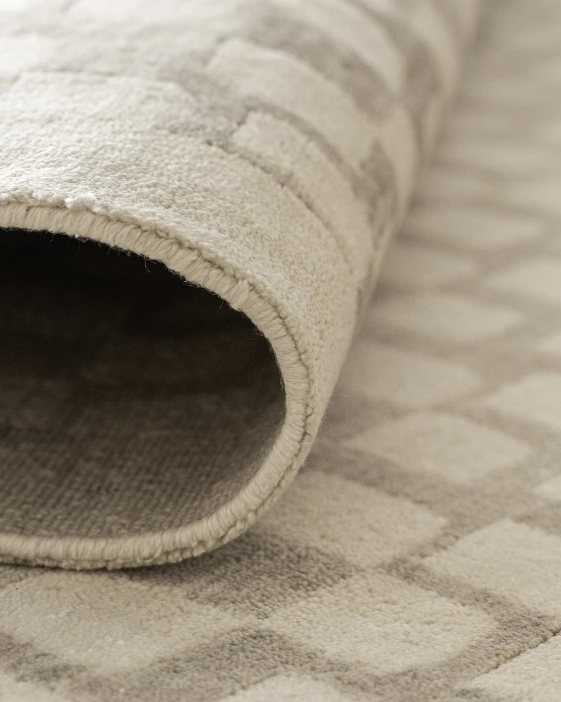 Chess Dune carpet in taupe and beige, shown in a product close-up as image 12