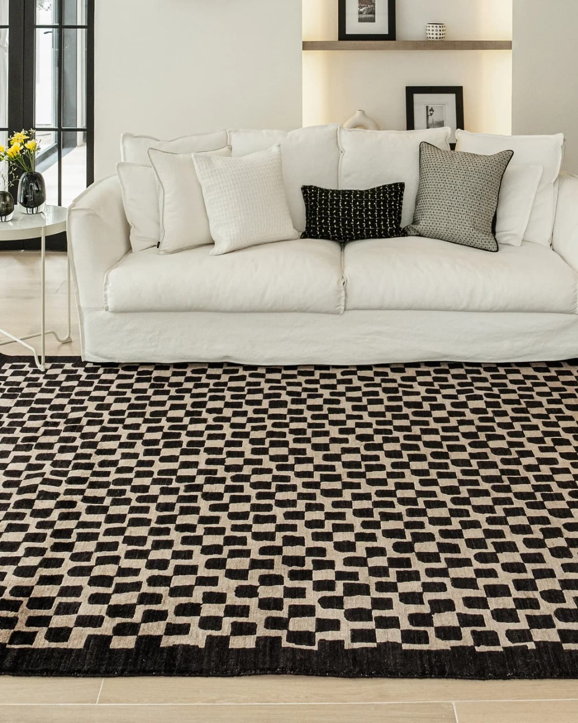 Chess Ebony carpet in beige and black, shown in a lifestyle front view as image 6