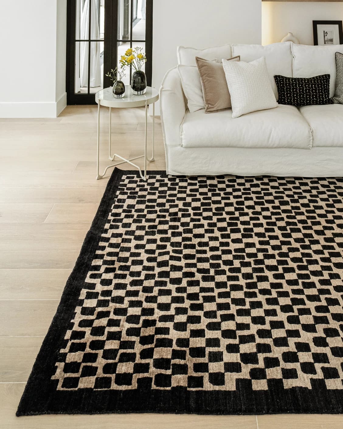 Chess Ebony carpet in beige and black, shown in a lifestyle front view as image 7