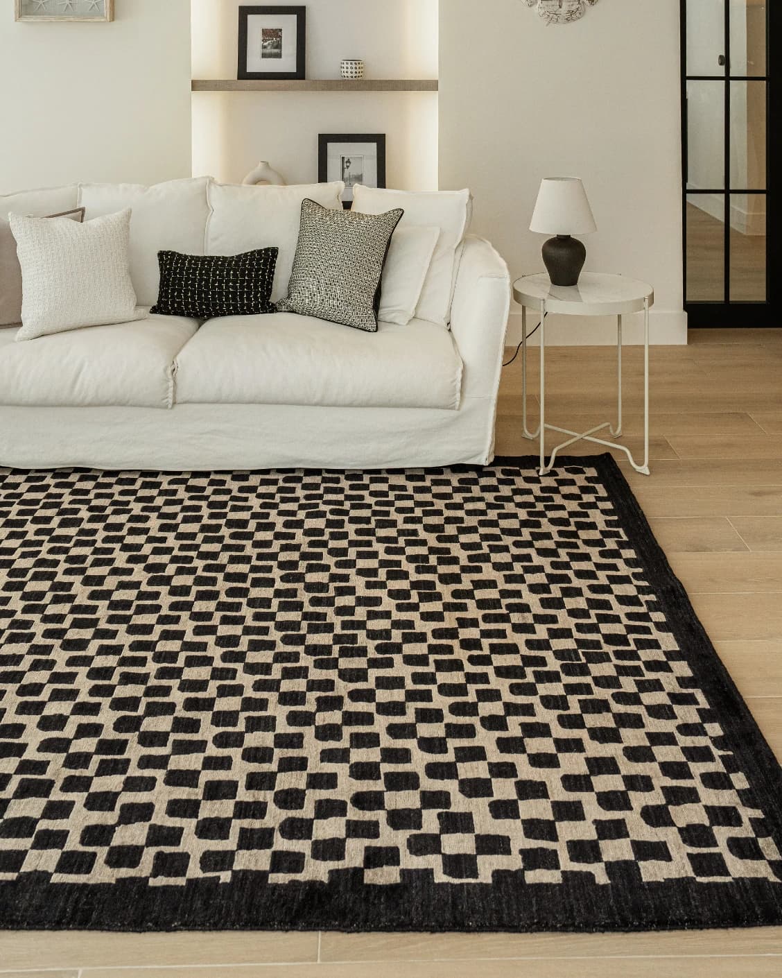 Chess Ebony carpet in beige and black, shown in a lifestyle front view as image 8