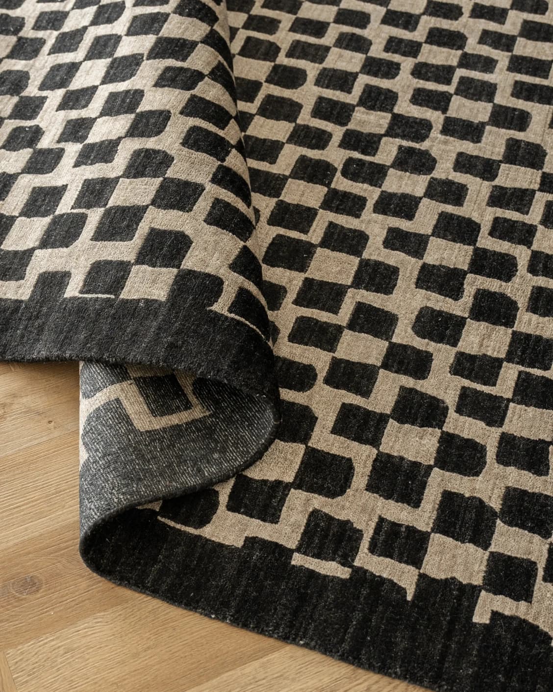 Chess Ebony carpet in beige and black, shown in a product close-up top view as image 11