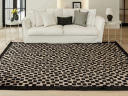 Chess Ebony carpet in ebony, beige and black, shown in a lifestyle front view