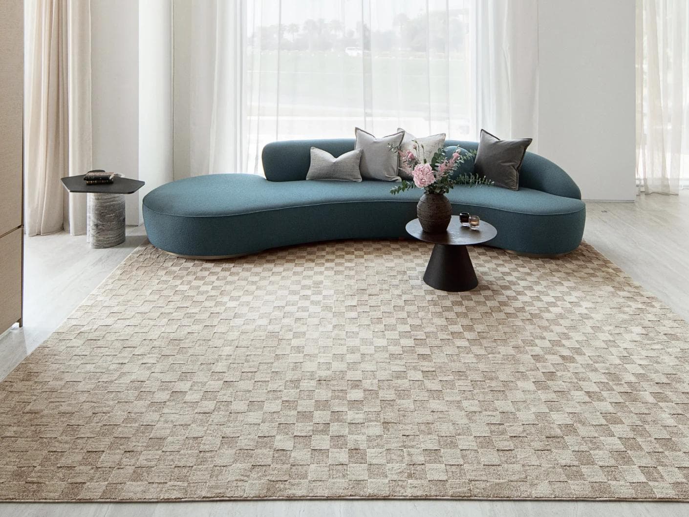 Cindy Dune Round carpet in taupe and beige, shown in a lifestyle front view as image 4