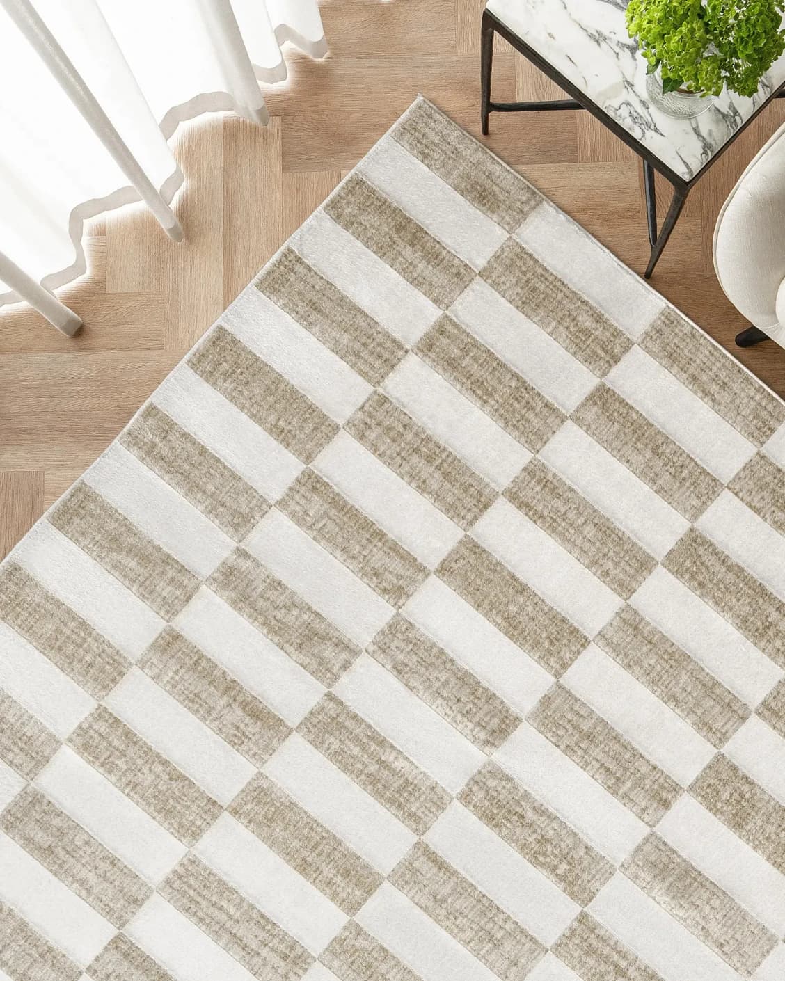 Cindy Tan carpet in tan, taupe and beige, shown in a lifestyle top view as image 2