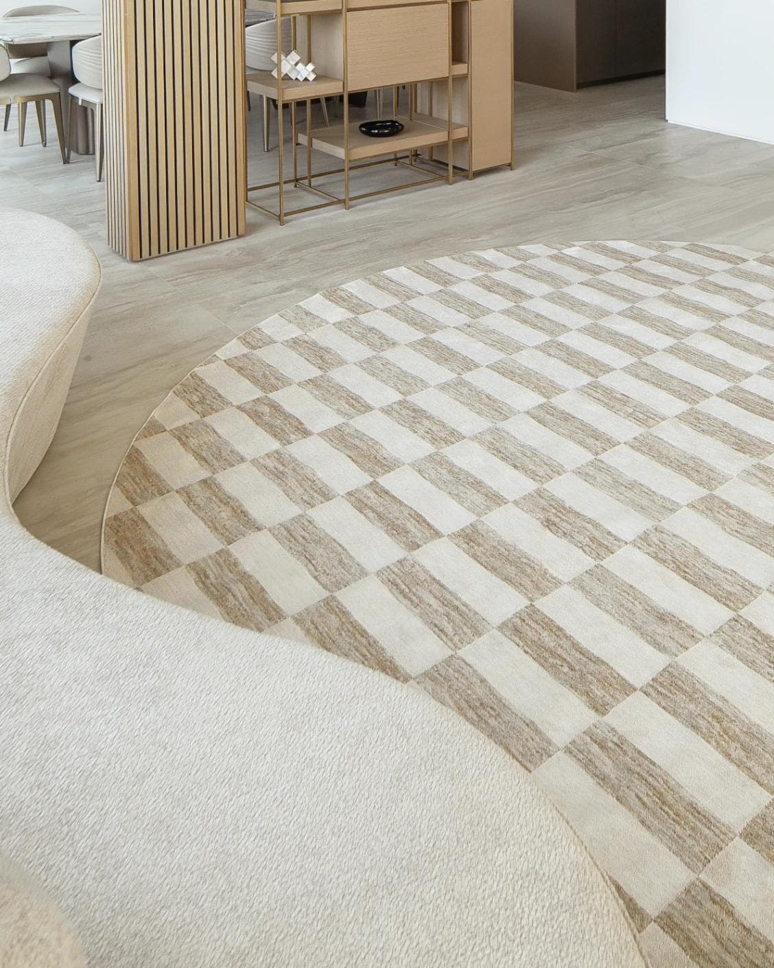 Cindy Tan Round carpet in taupe and beige, shown in a lifestyle left view as image 5