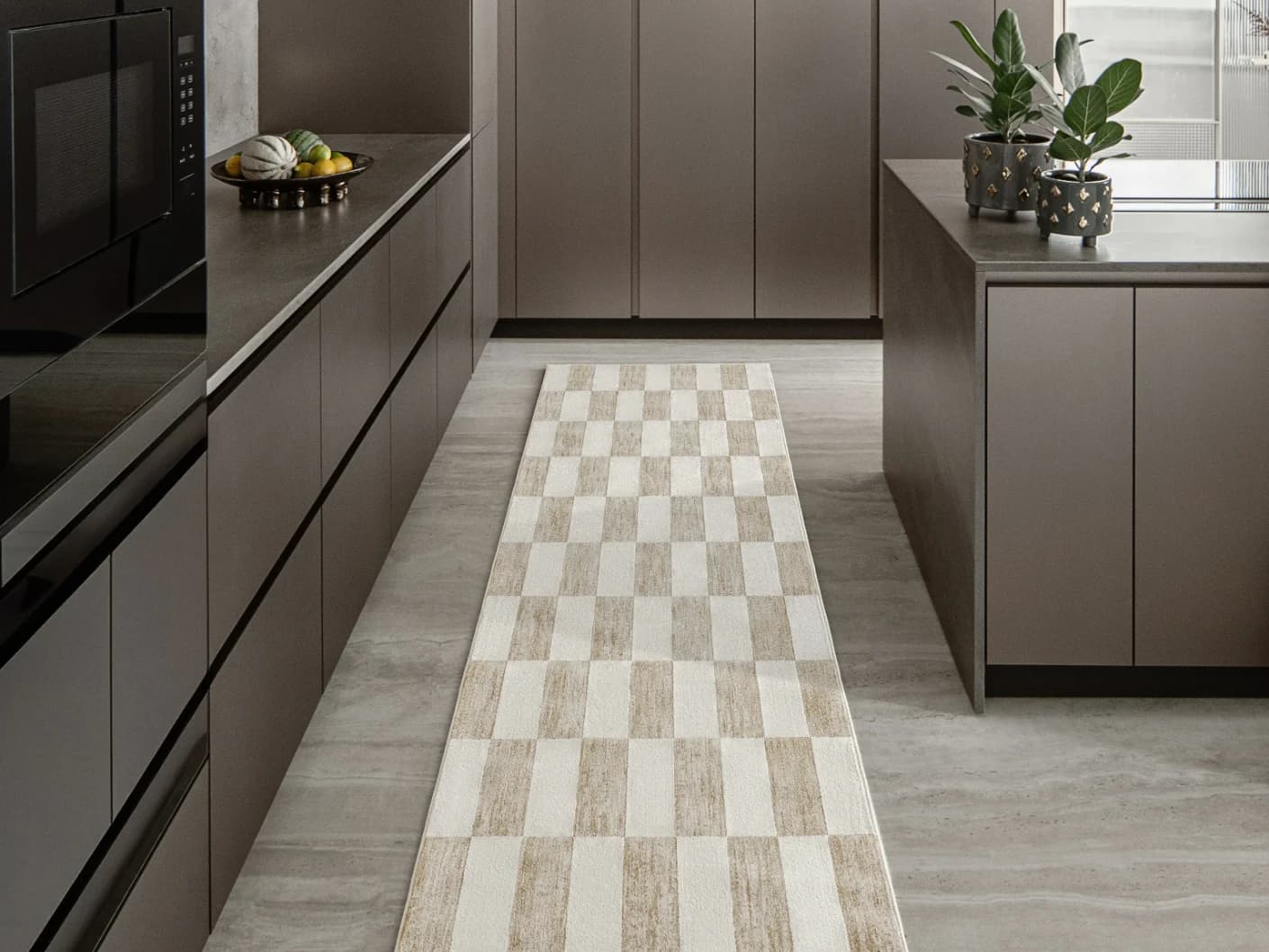 Zen Bianca Round carpet in charcoal and beige, shown in a lifestyle front view