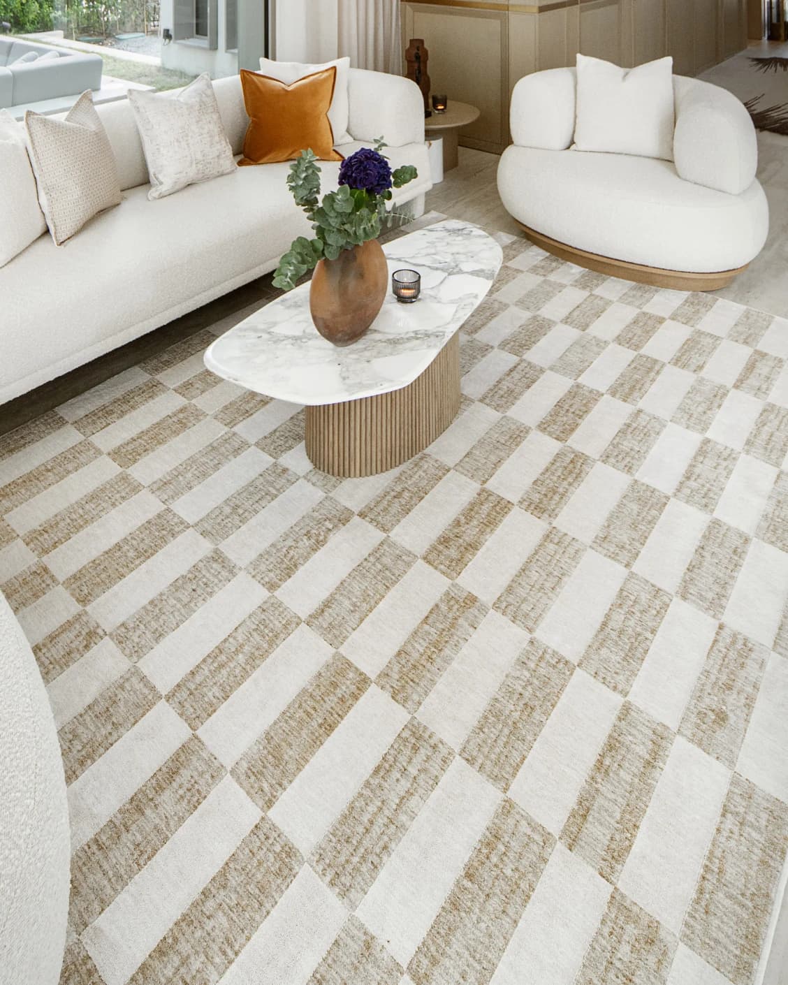 Cindy Tan carpet in tan, taupe and beige, shown in a lifestyle left view as image 4