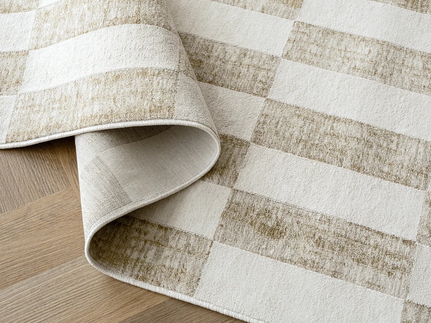 Cindy Tan carpets in tan, taupe and beige, shown in a product close-up view