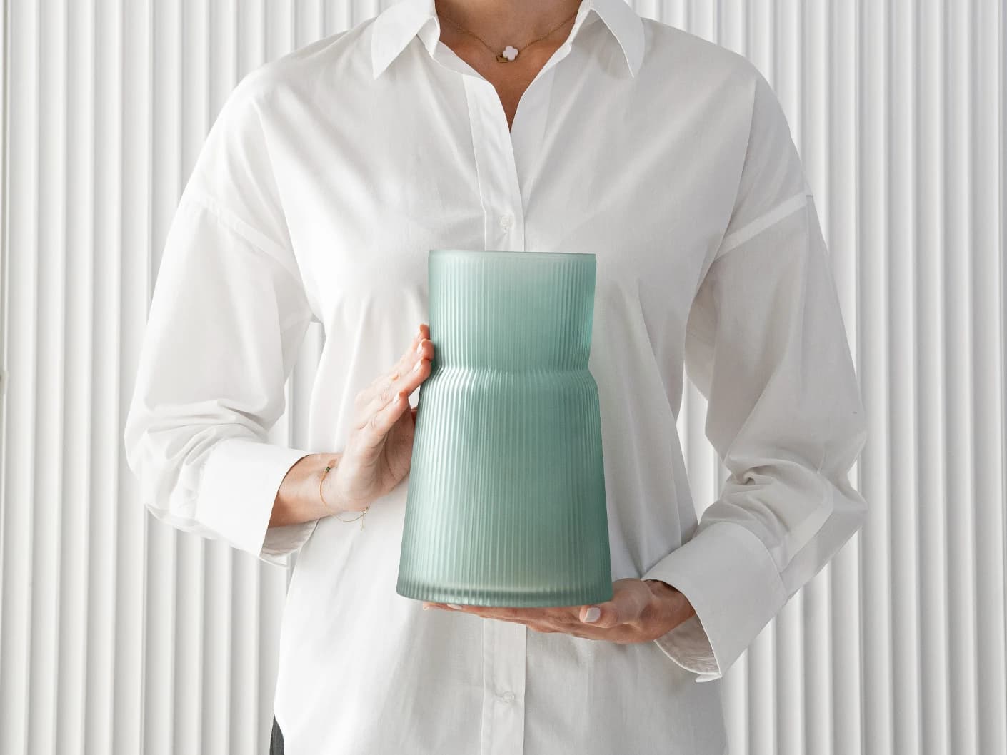 Cloris Storms vases in turquoise, shown in a product front view