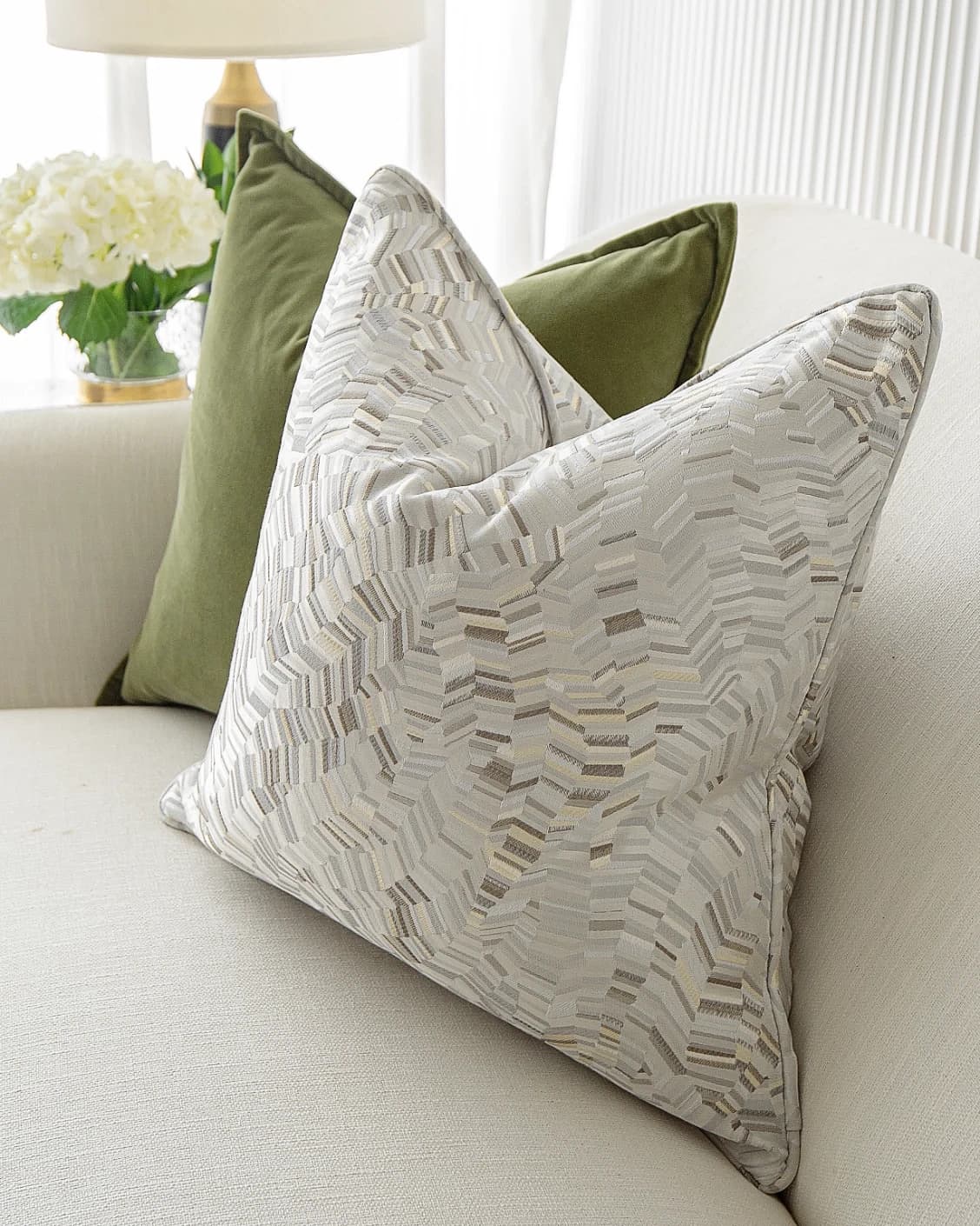 Clover Bundle cushion, shown in a lifestyle front view as image 6