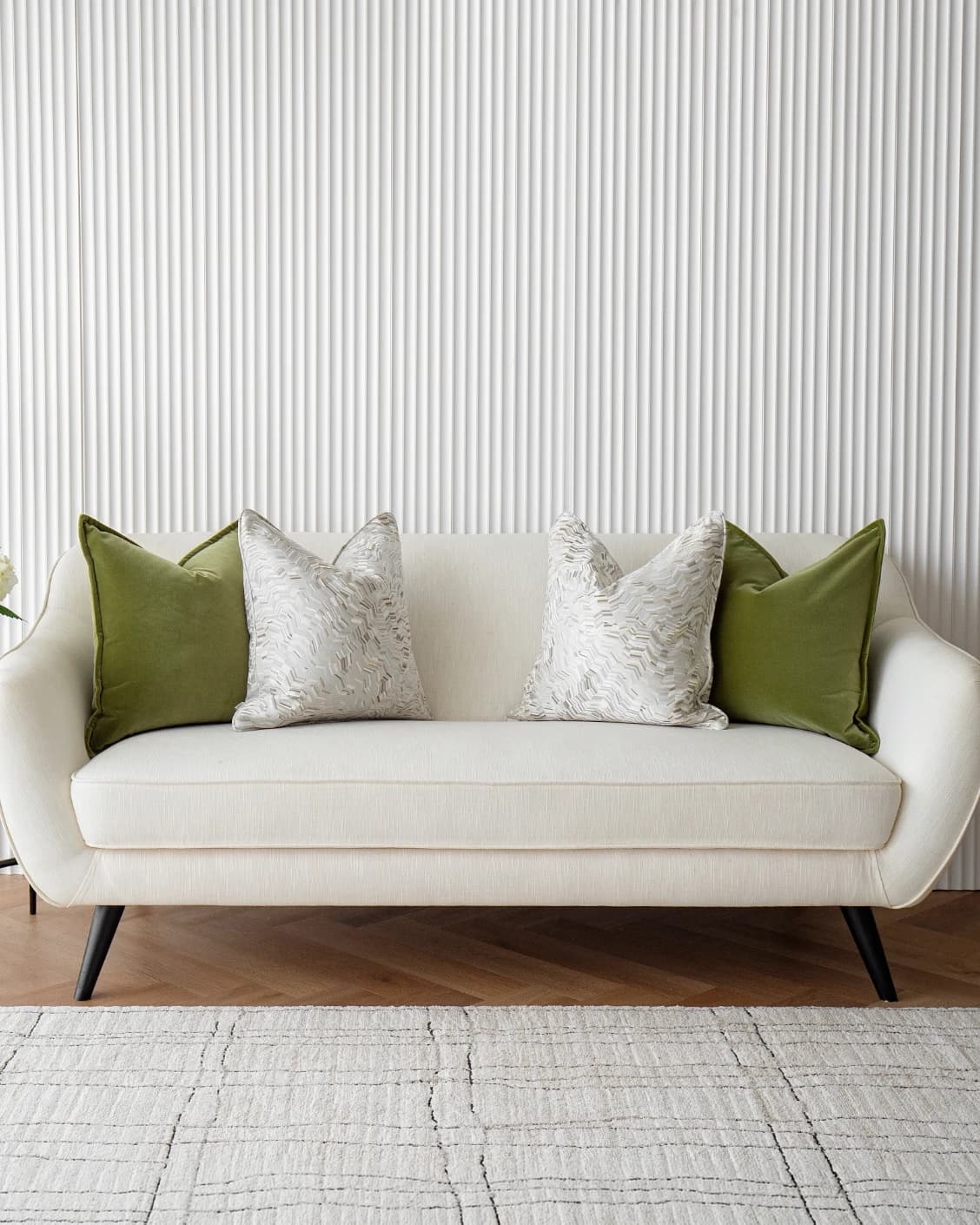 Clover Bundle cushion, shown in a lifestyle front view as image 2
