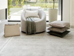 Colin Alba carpet in white and grey, shown in a lifestyle front view