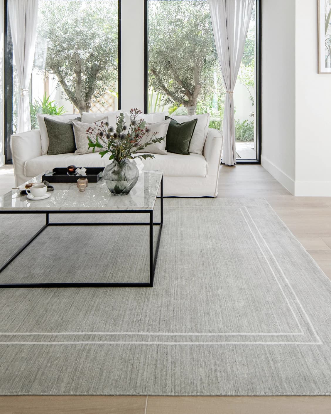 Colin Alba carpet in white and grey, shown in a lifestyle front view as image 5