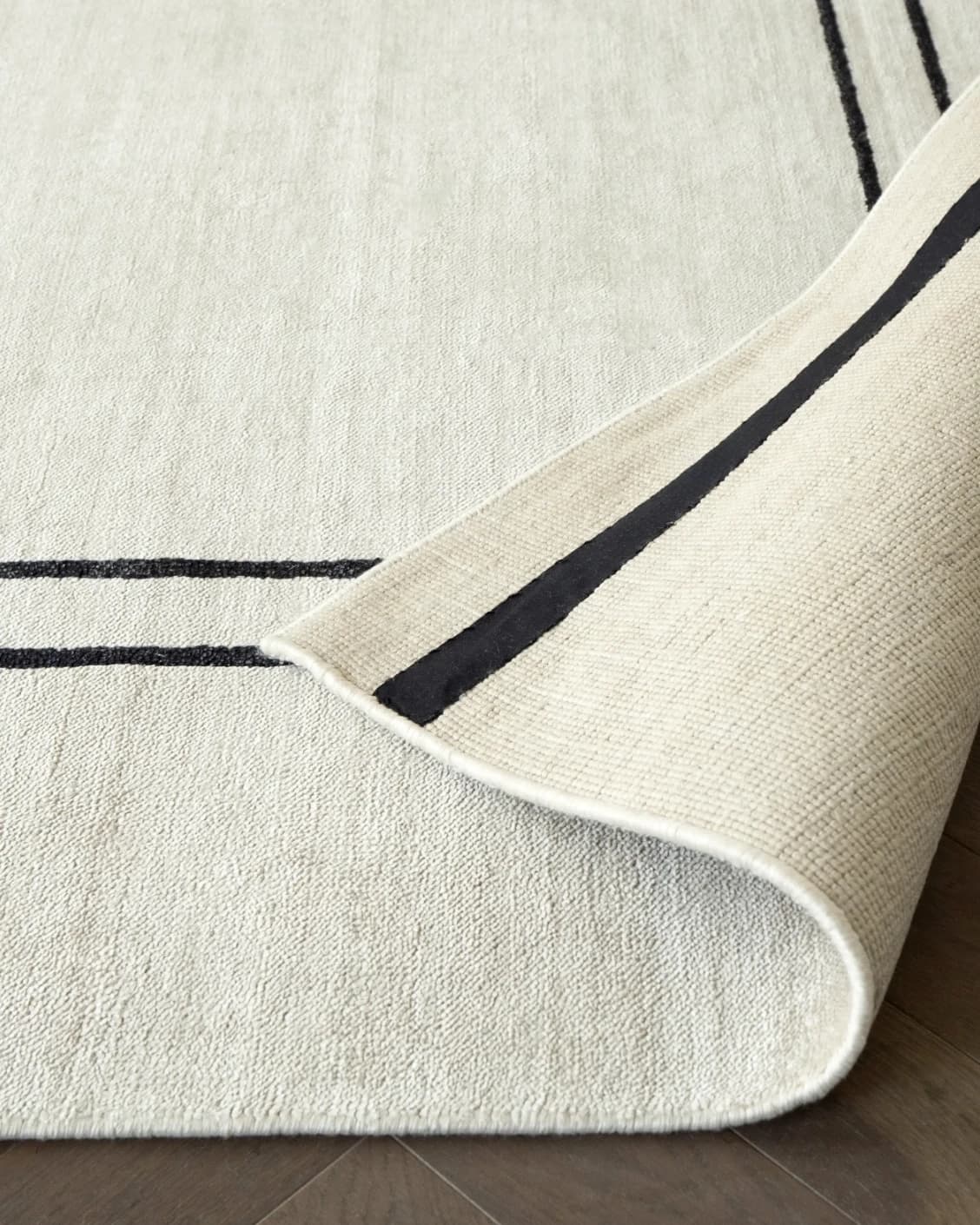 Colin Bianca carpet in white, black and pearl, shown in a product close-up front view as image 4