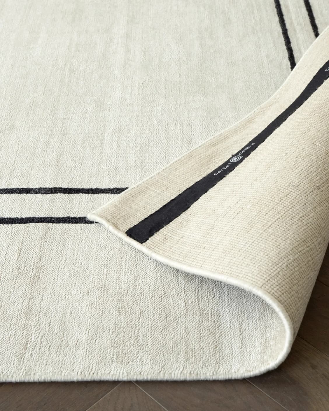 Colin Bianca carpet in white, black and pearl, shown in a product close-up front view as image 4
