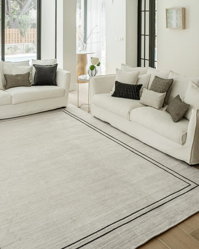 Colin Bianca carpets in white, black and pearl, shown in a close-up front view as image 9