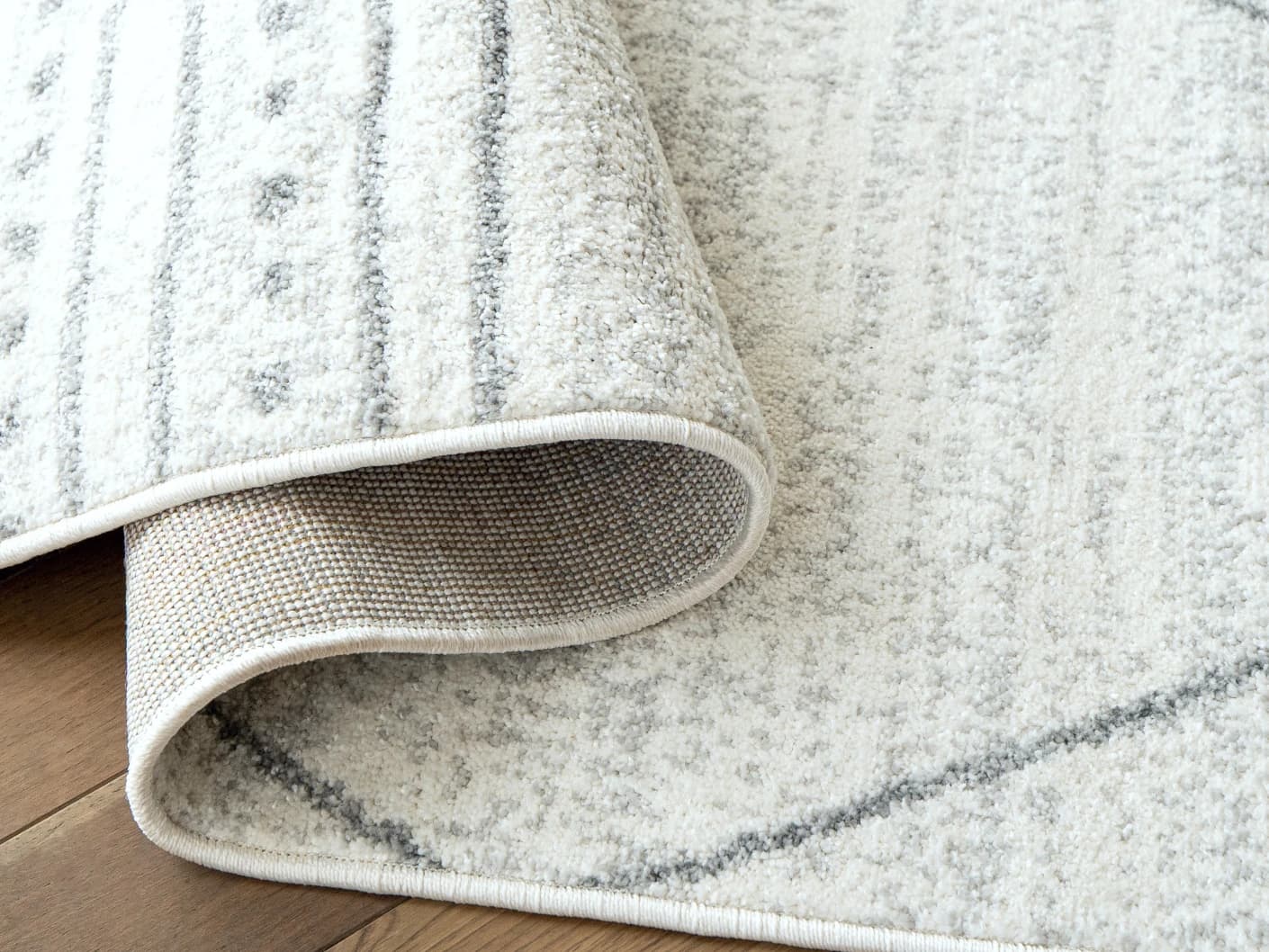 Conrad Bianca carpets in grey and white, shown in a product close-up view