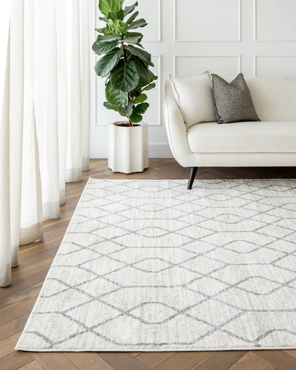 Conrad Lily carpet in ivory and grey, shown in a lifestyle front view as image 4
