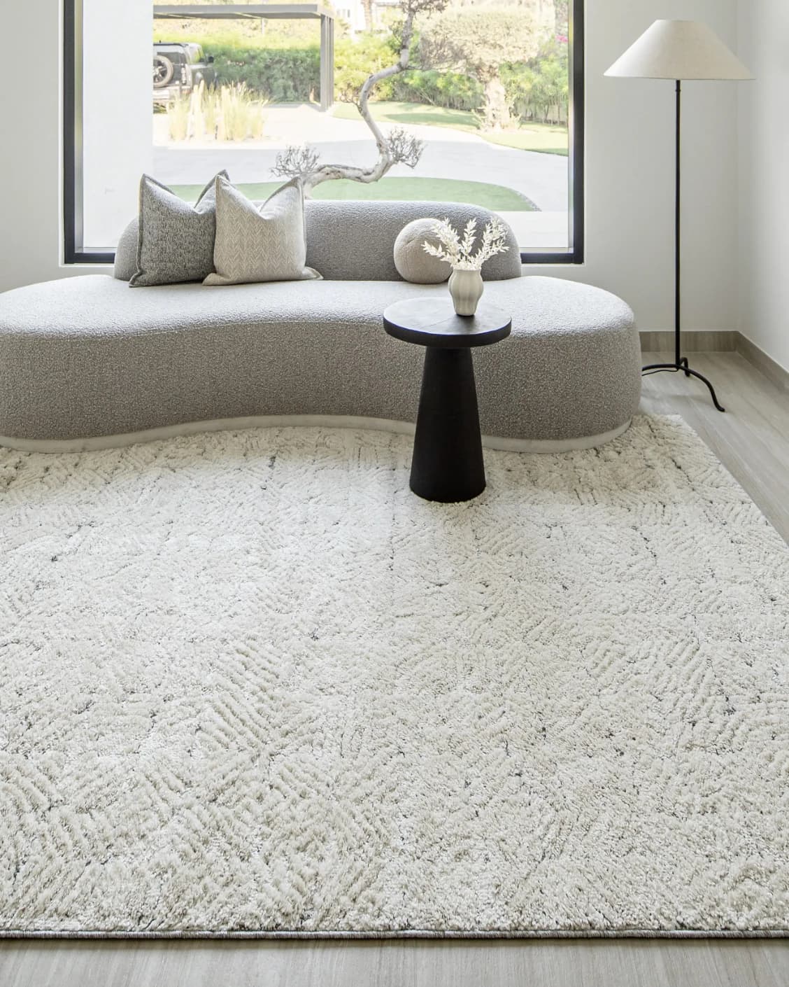 Conrad Sandy carpet in beige and grey, shown in a lifestyle front view as image 4