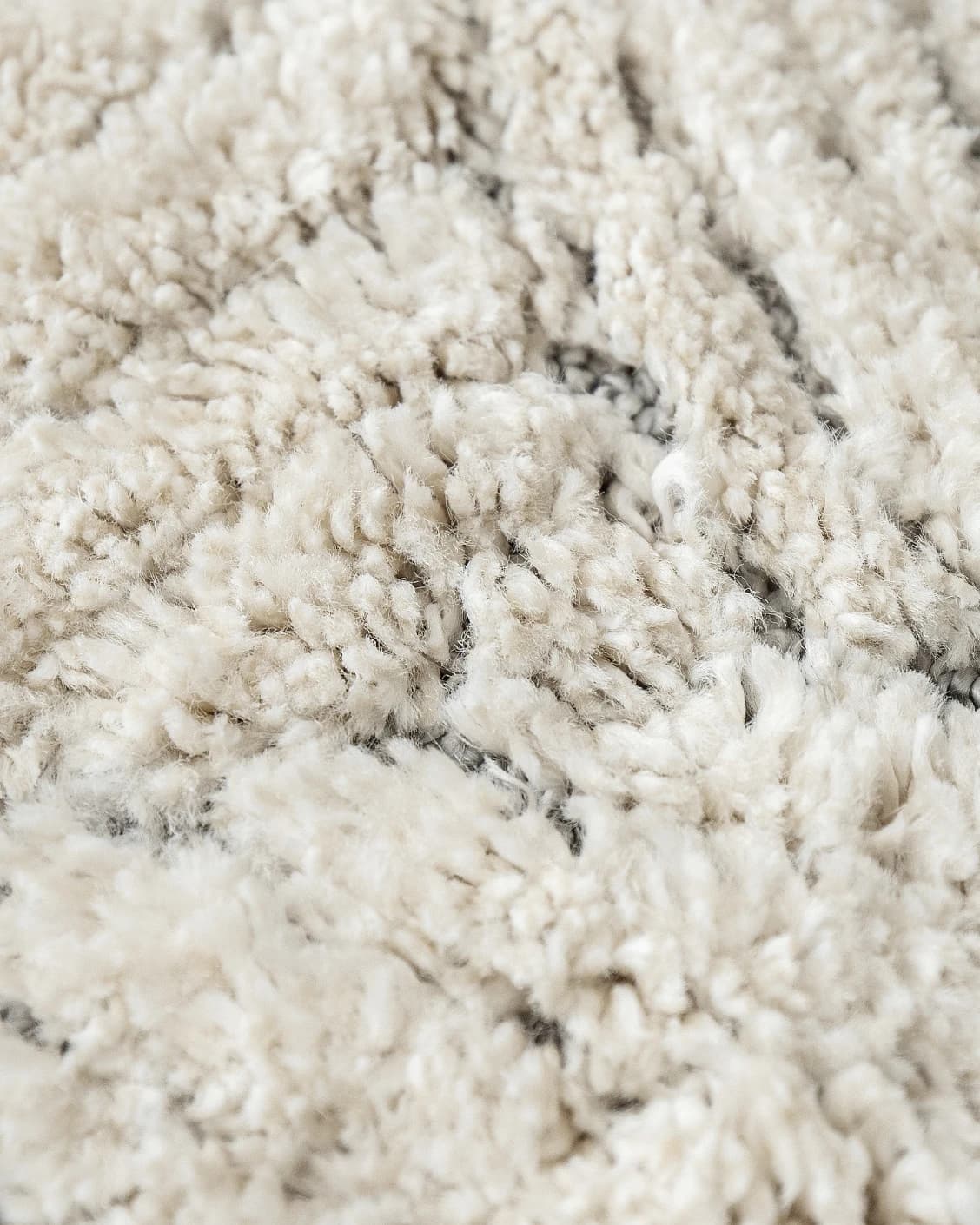 Conrad Sandy carpet in beige and grey, shown in a product close-up as image 10