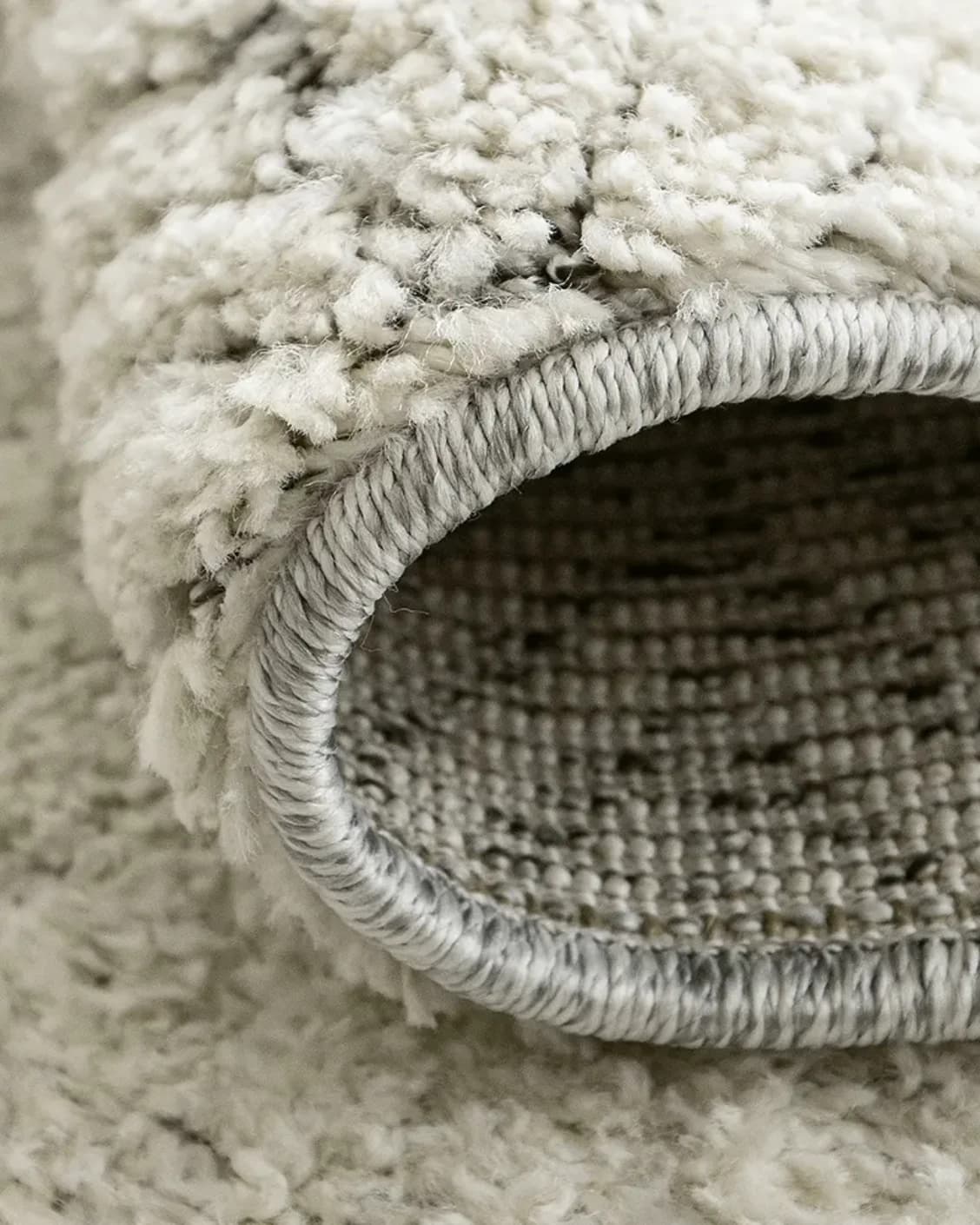 Conrad Sandy carpet in beige and grey, shown in a product close-up as image 11