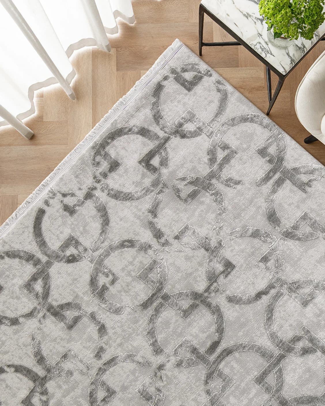 Cooper Dune carpet in dune, grey and silver, shown in a lifestyle top view as image 2