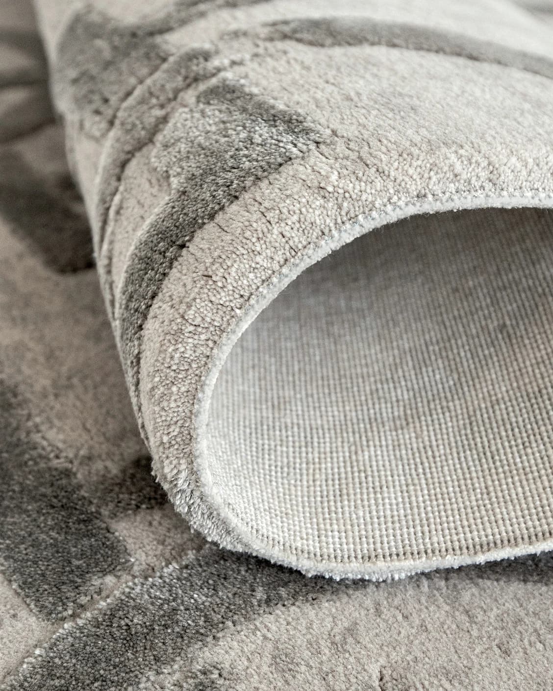 Cooper Dune carpet in dune, grey and silver, shown in a product close-up as image 8