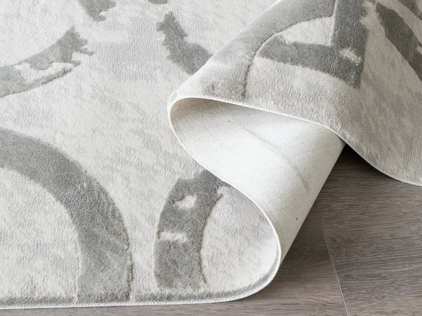 Cooper Dune carpets in dune, grey and silver, shown in a product close-up view