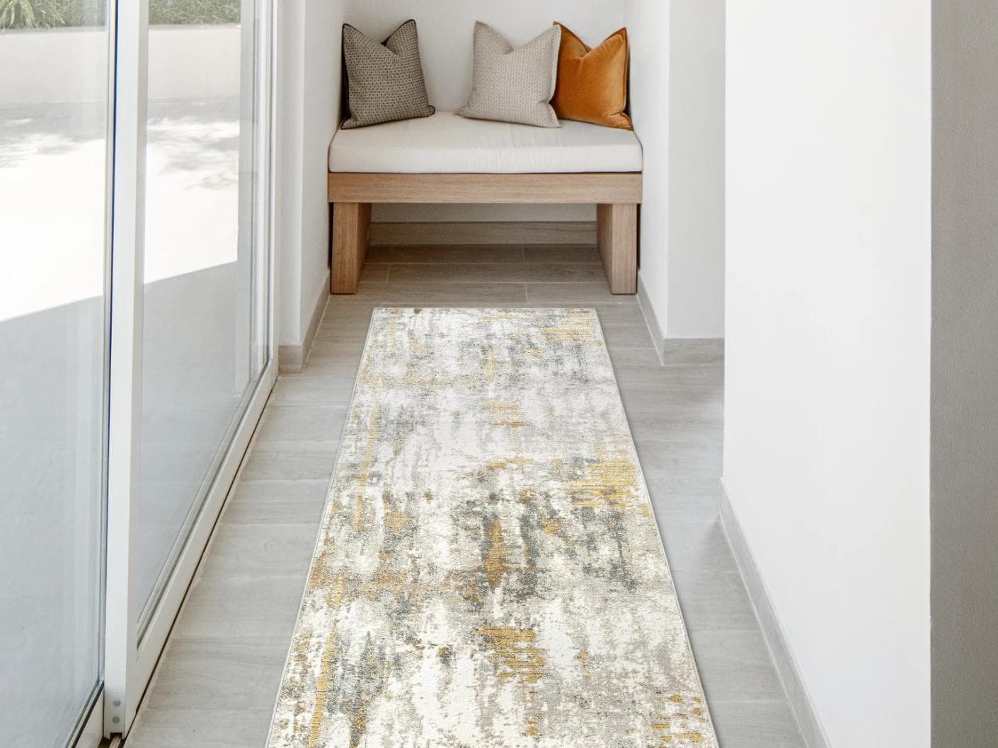 Cooper Goldberg carpets in grey and gold, shown in a lifestyle front view as image 1