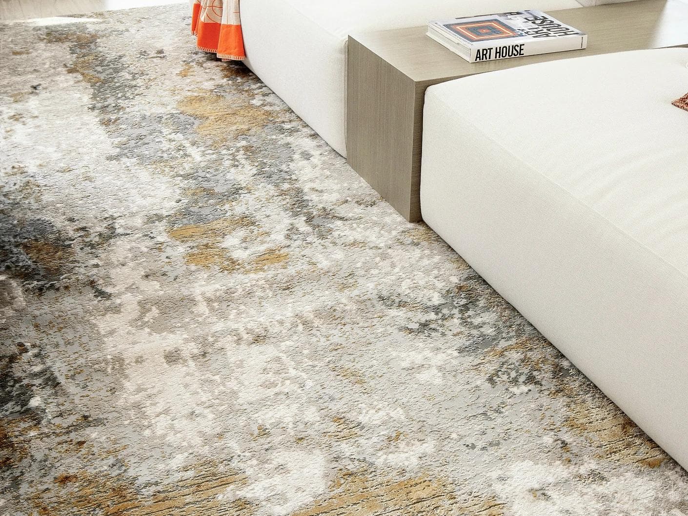 Cooper Goldberg carpets in grey and gold, shown in a lifestyle close-up left view as image 3