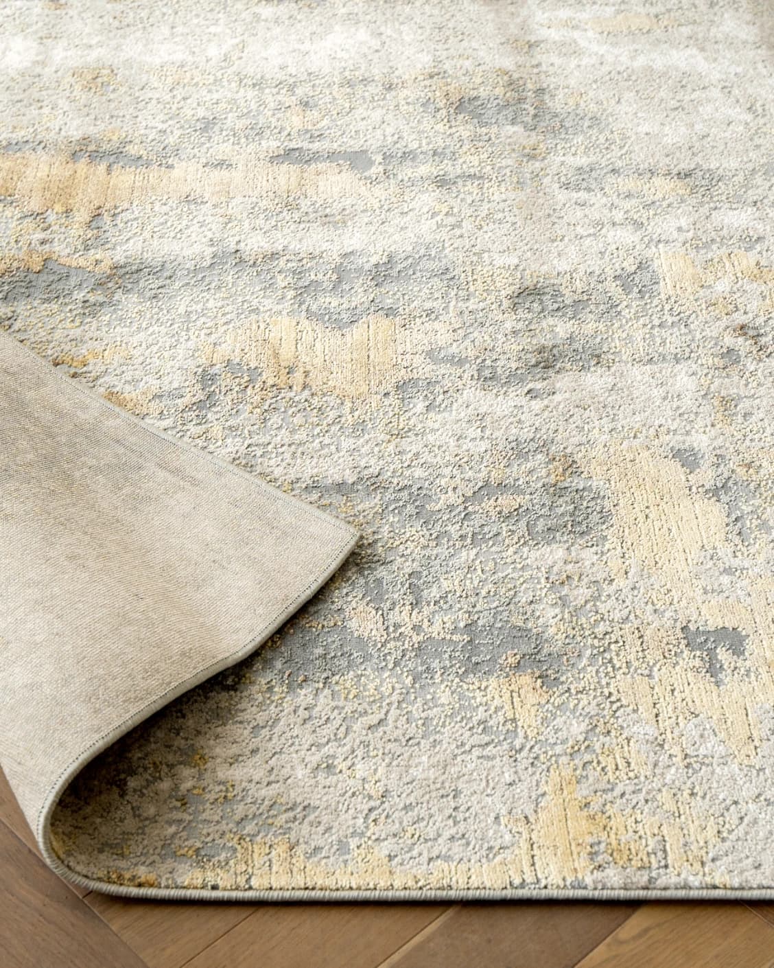 Cooper Goldberg carpet in grey and gold, shown in a product close-up as image 11