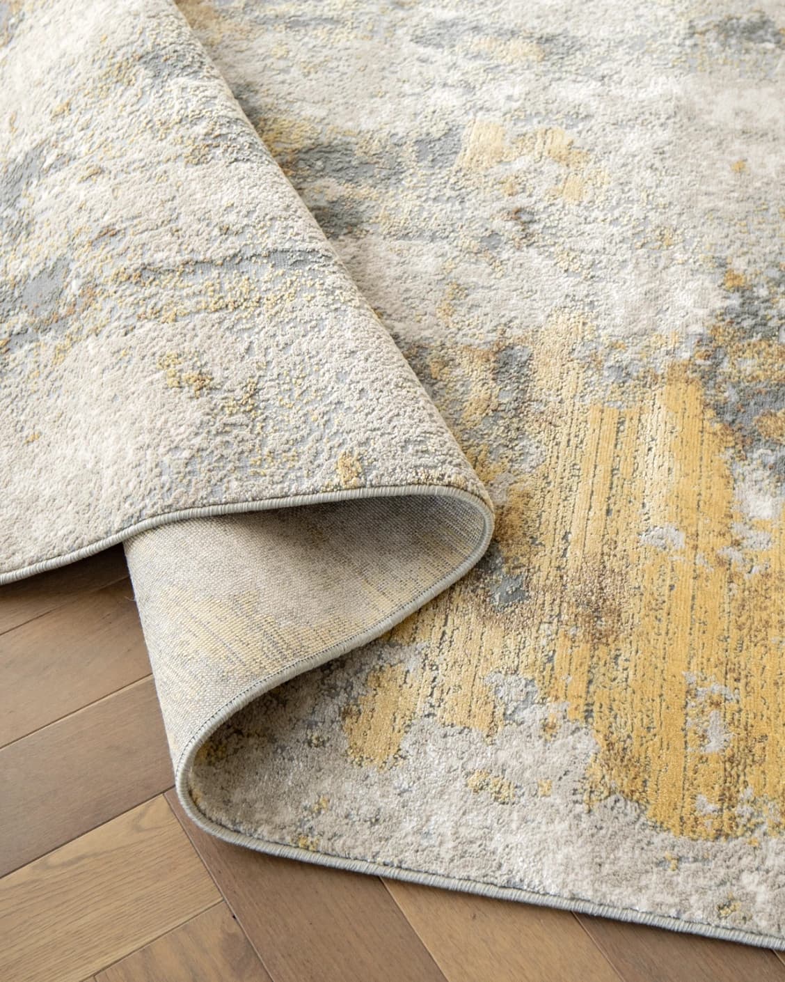 Cooper Goldberg carpet in grey and gold, shown in a product close-up as image 12