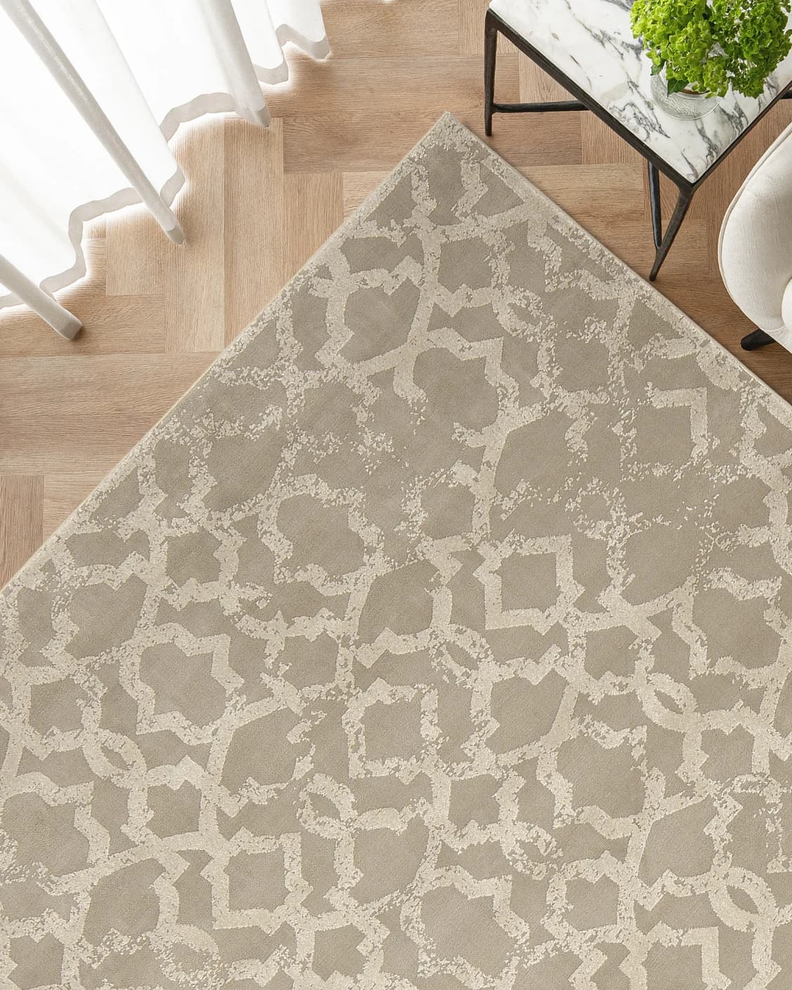 Cooper Sandy carpet in sandy, beige and ivory, shown in a lifestyle top view as image 2