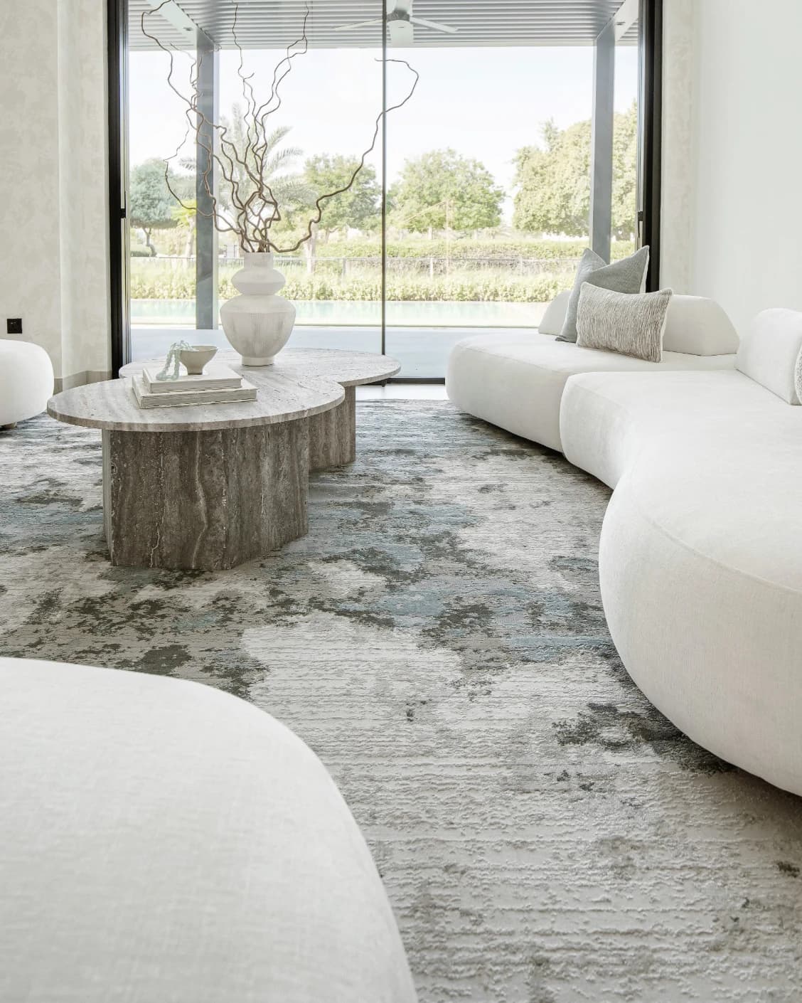 Cooper Sky carpet in sky, blue and grey, shown in a lifestyle right view as image 8
