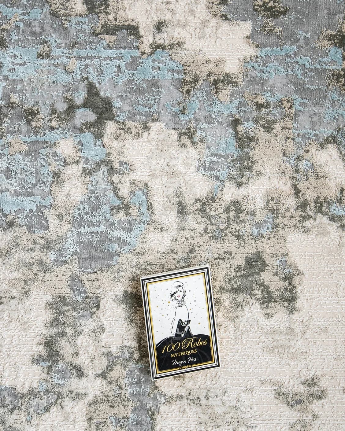 Cooper Sky carpet in sky, blue and grey, shown in a lifestyle top view as image 12